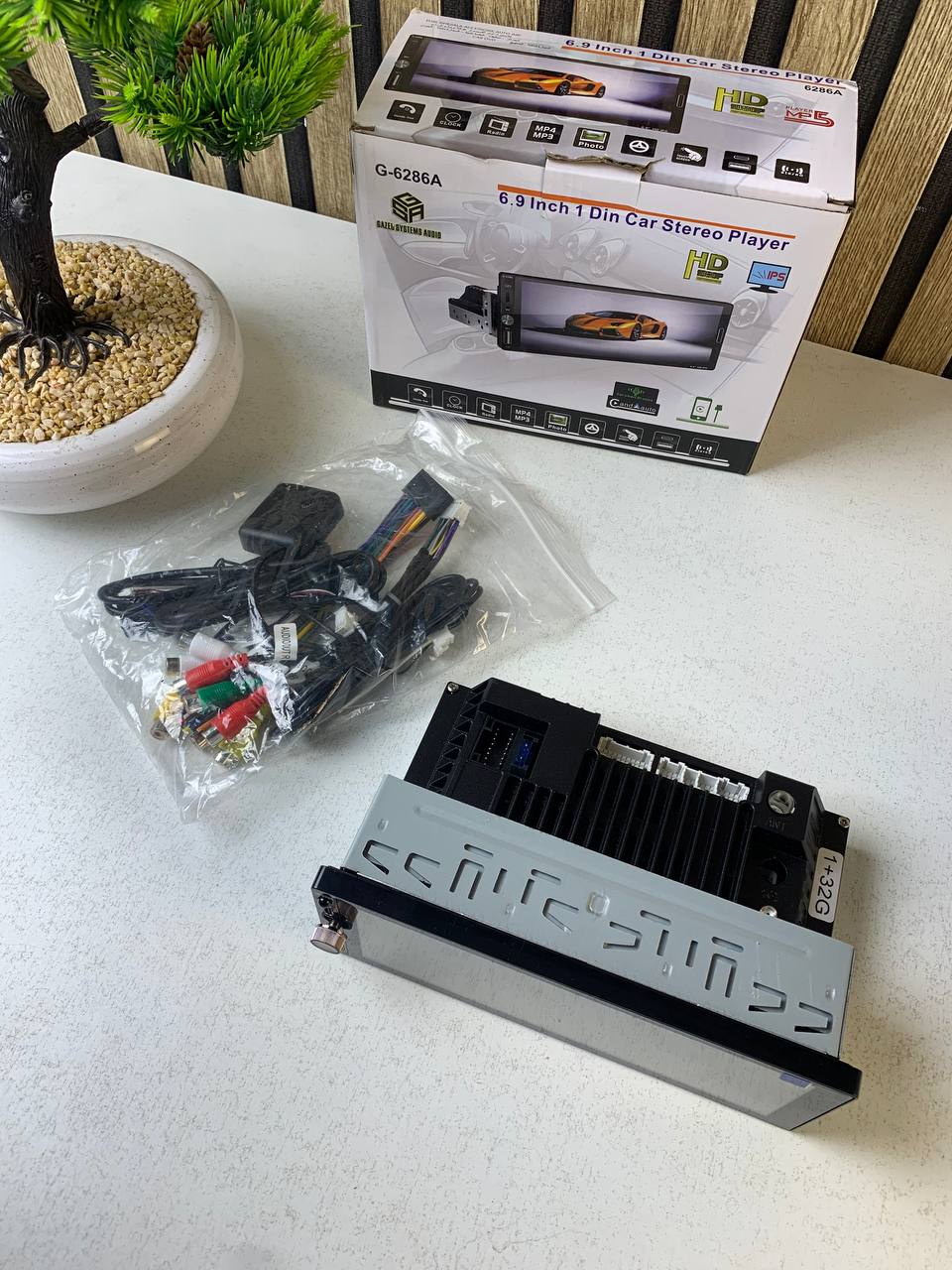 Autoradio 1 DIN avec écran Tactile de 6,9 Pouces Compatible avec Apple CarPlay Wireless/Android Auto - جهاز راديو سيارة