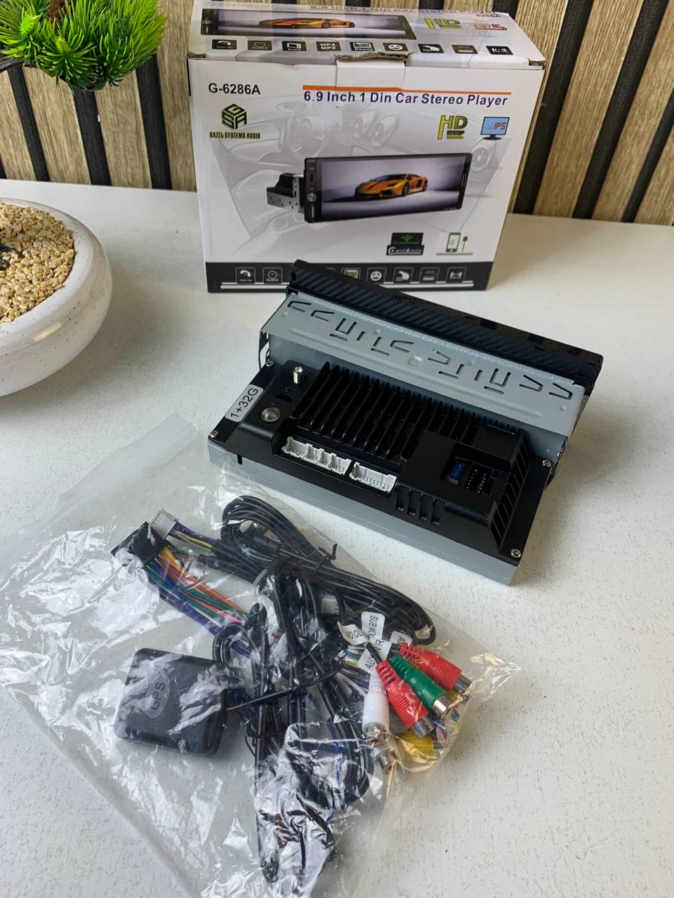 Autoradio 1 DIN avec écran Tactile de 6,9 Pouces Compatible avec Apple CarPlay Wireless/Android Auto - جهاز راديو سيارة